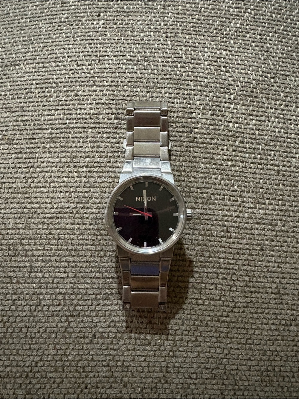 Nixon Men’s Silver Bracelet Watch with Black Dial and Red Second Hand
